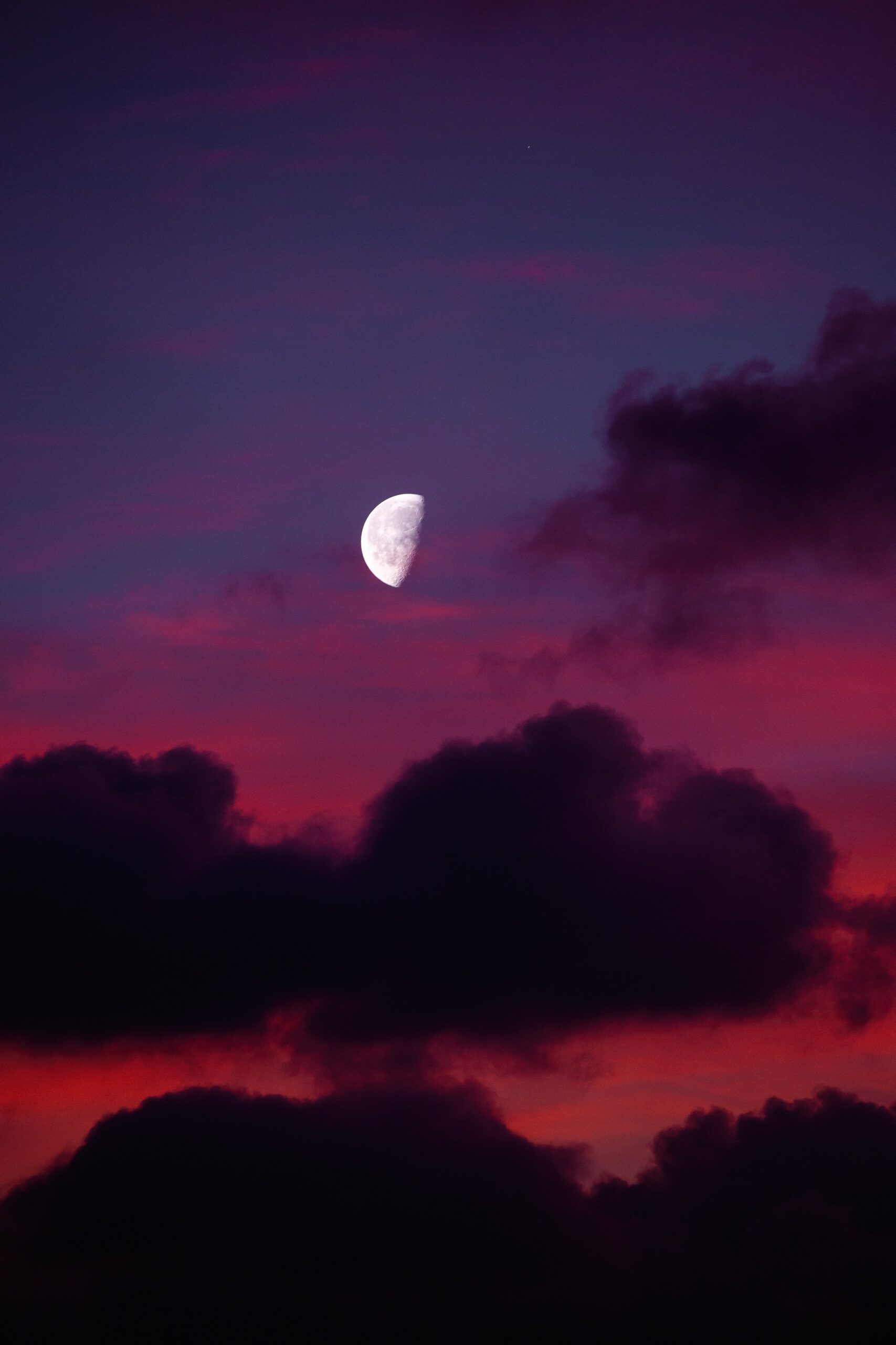 crescent moon dramatic sunset dark