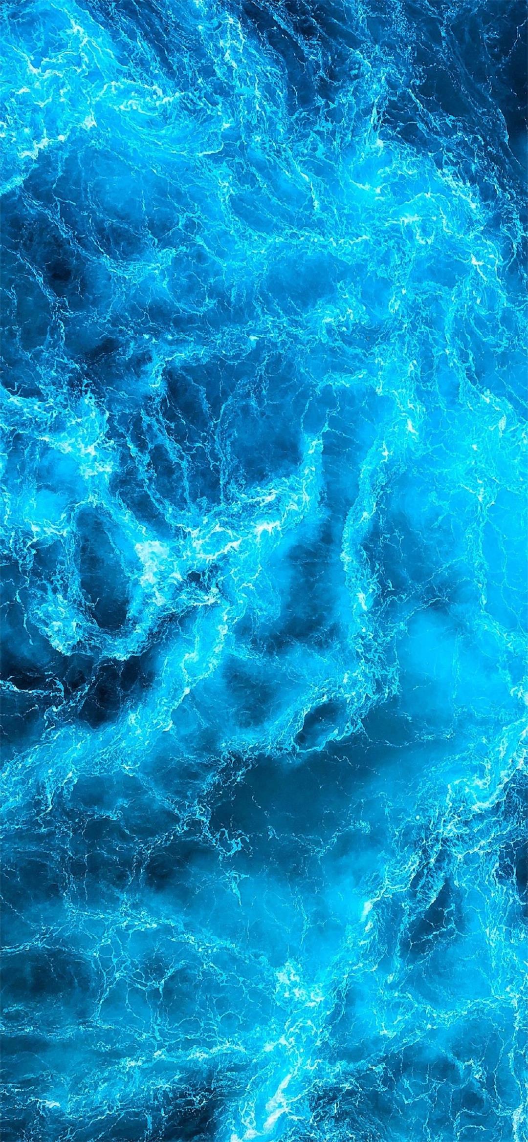 dark blue water ocean waves turbulent