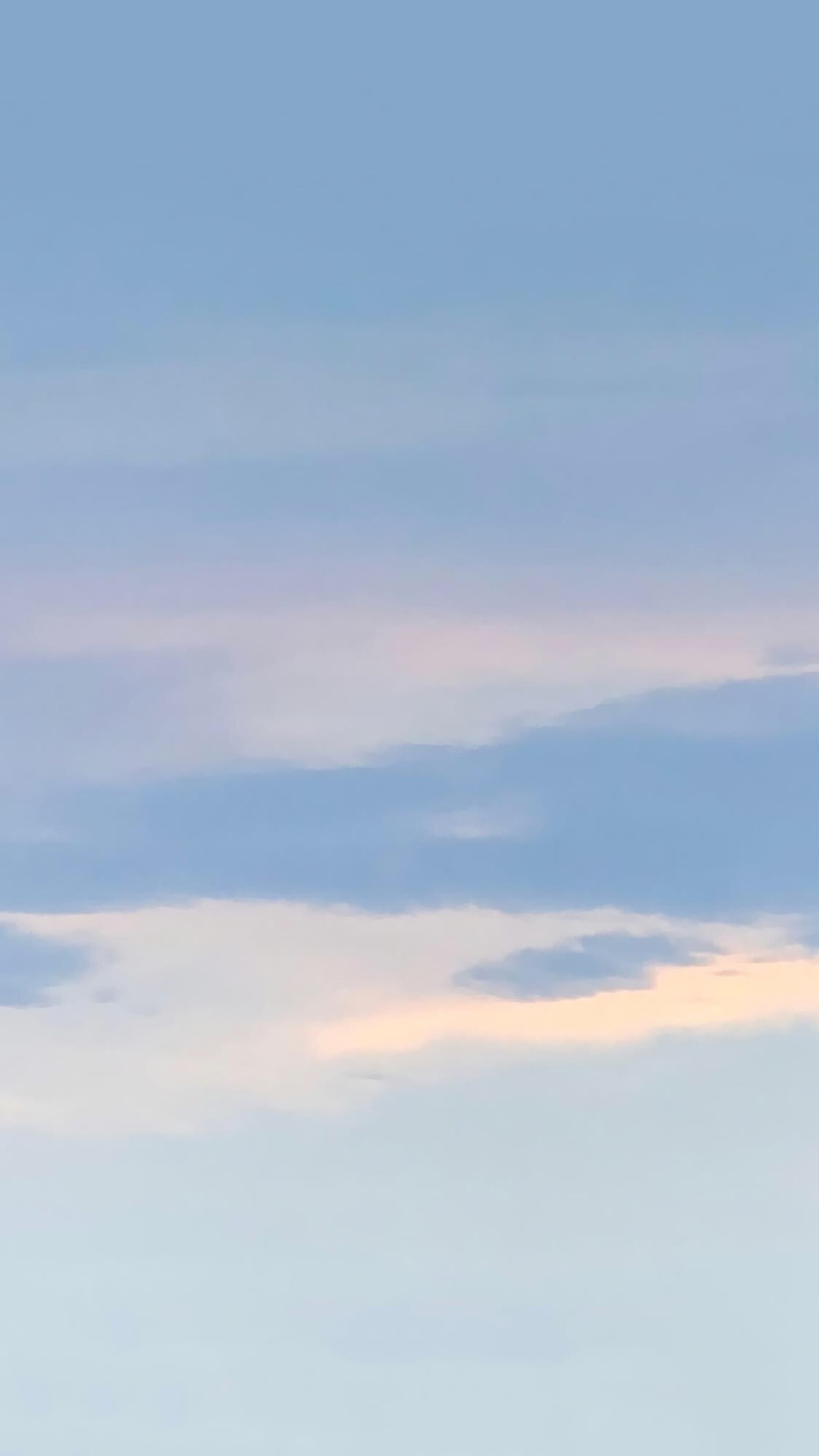 pastel sky soft blue pink clouds serene