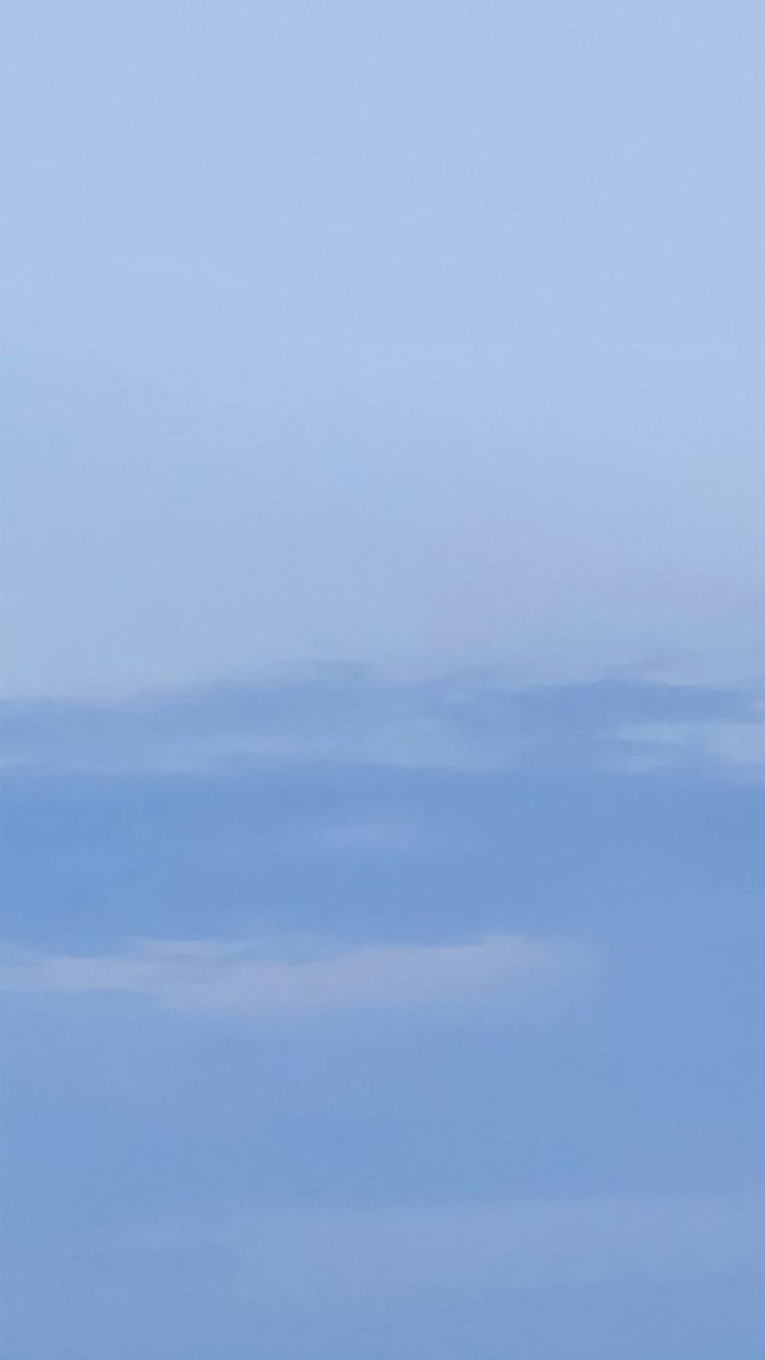blue sky layered clouds soft pastel