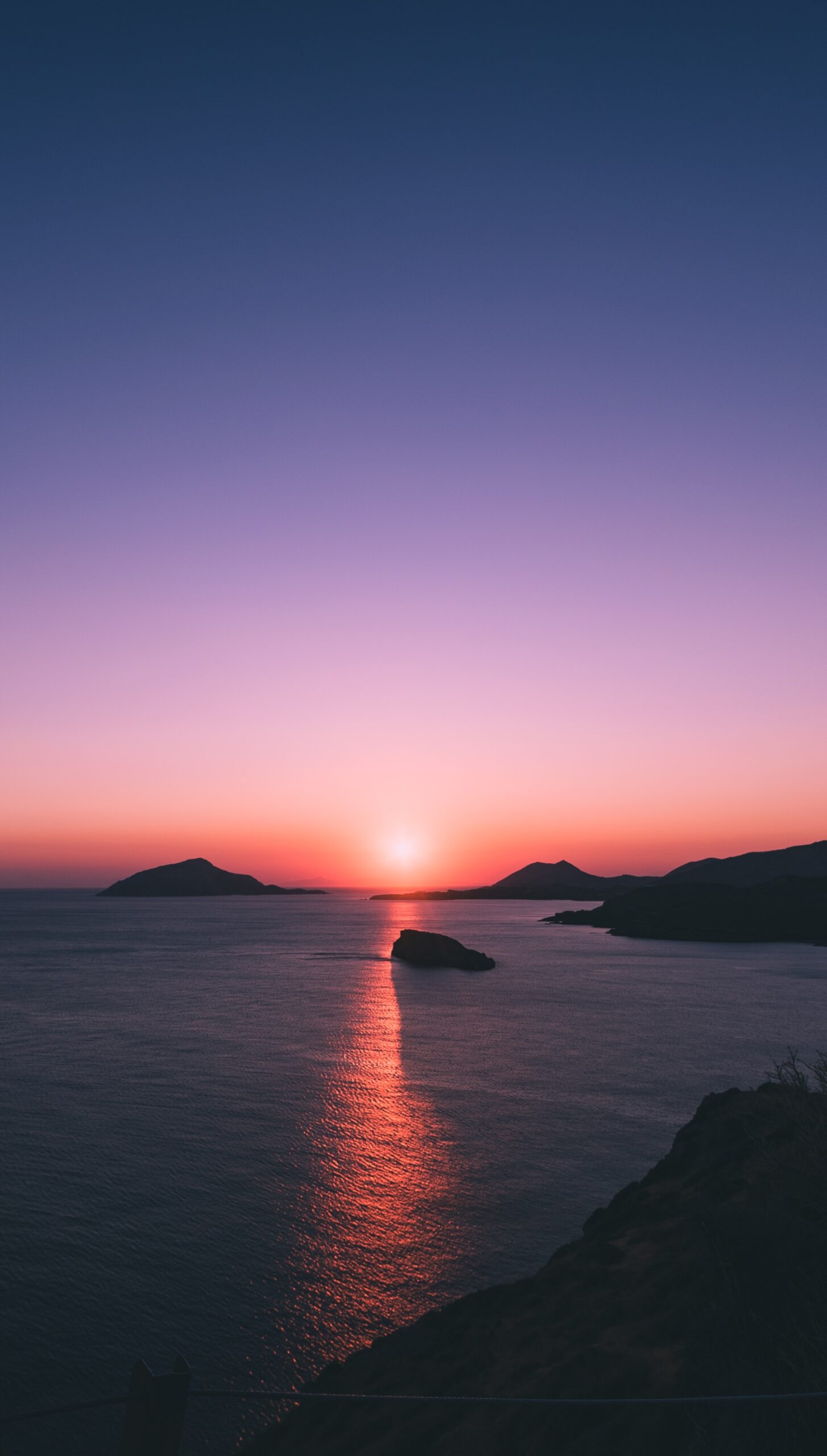 sunset ocean sea islands silhouette