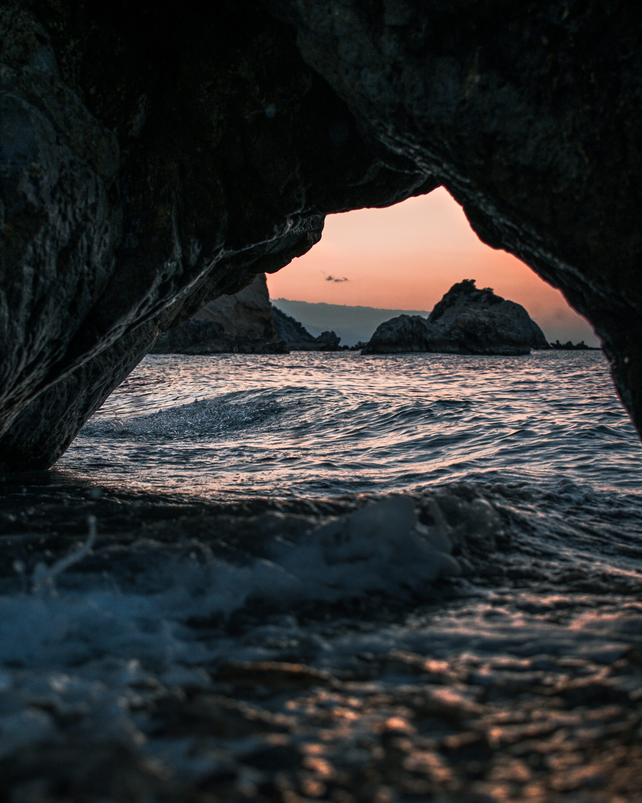 sea cave sunset ocean waves coastal