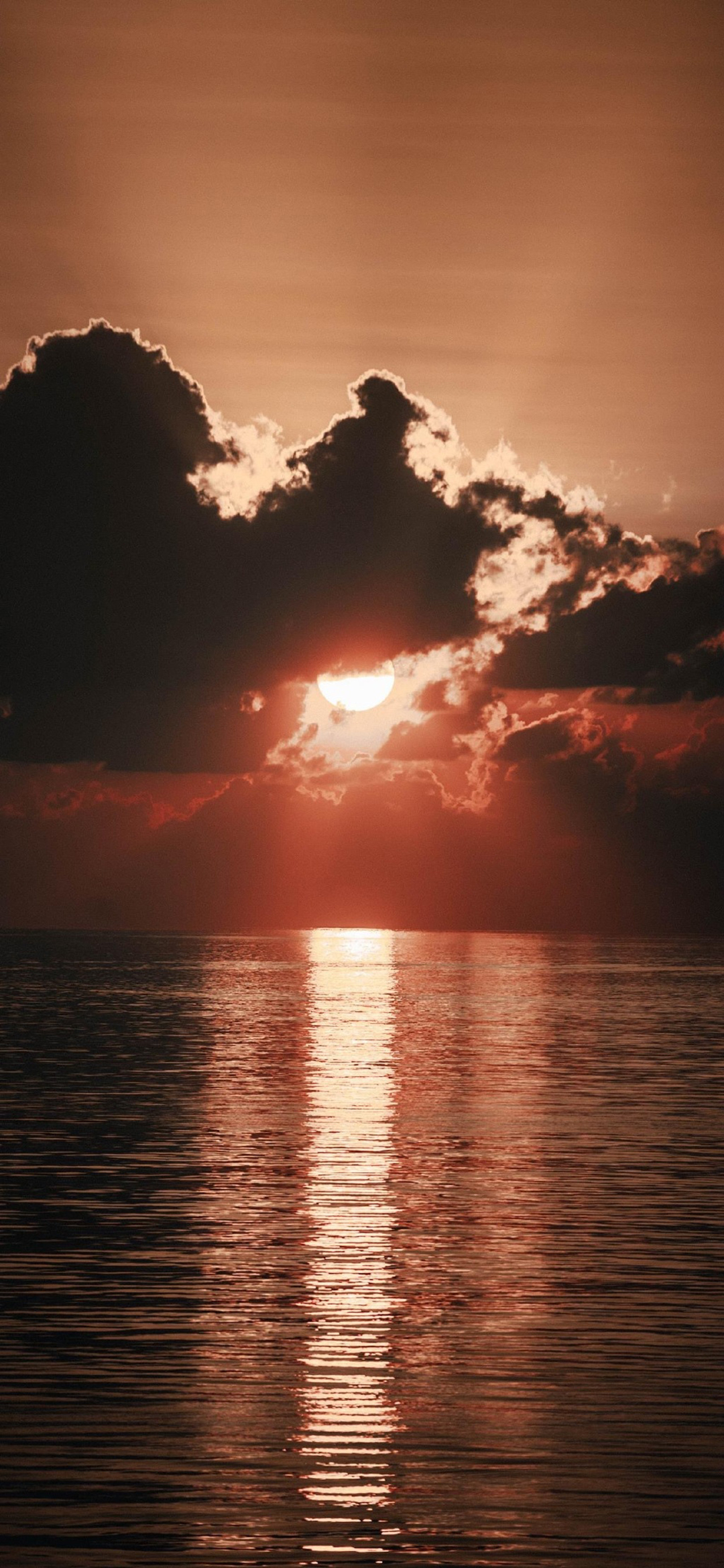 sunset ocean horizon clouds orange sky